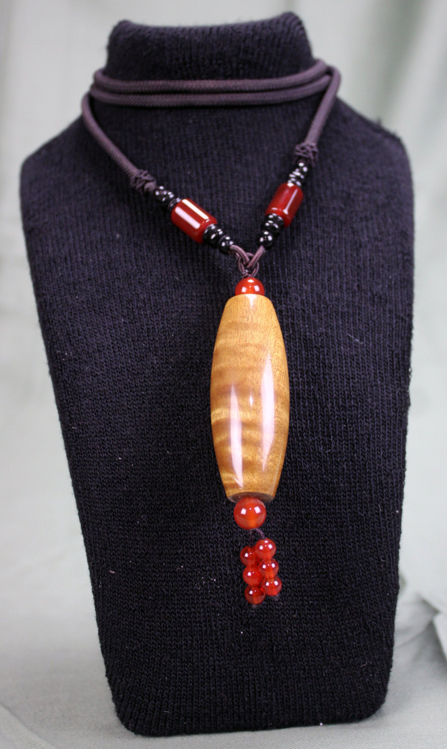 Golden Phoebe Wood Dzi Pendant Necklace with Red Agate Accents