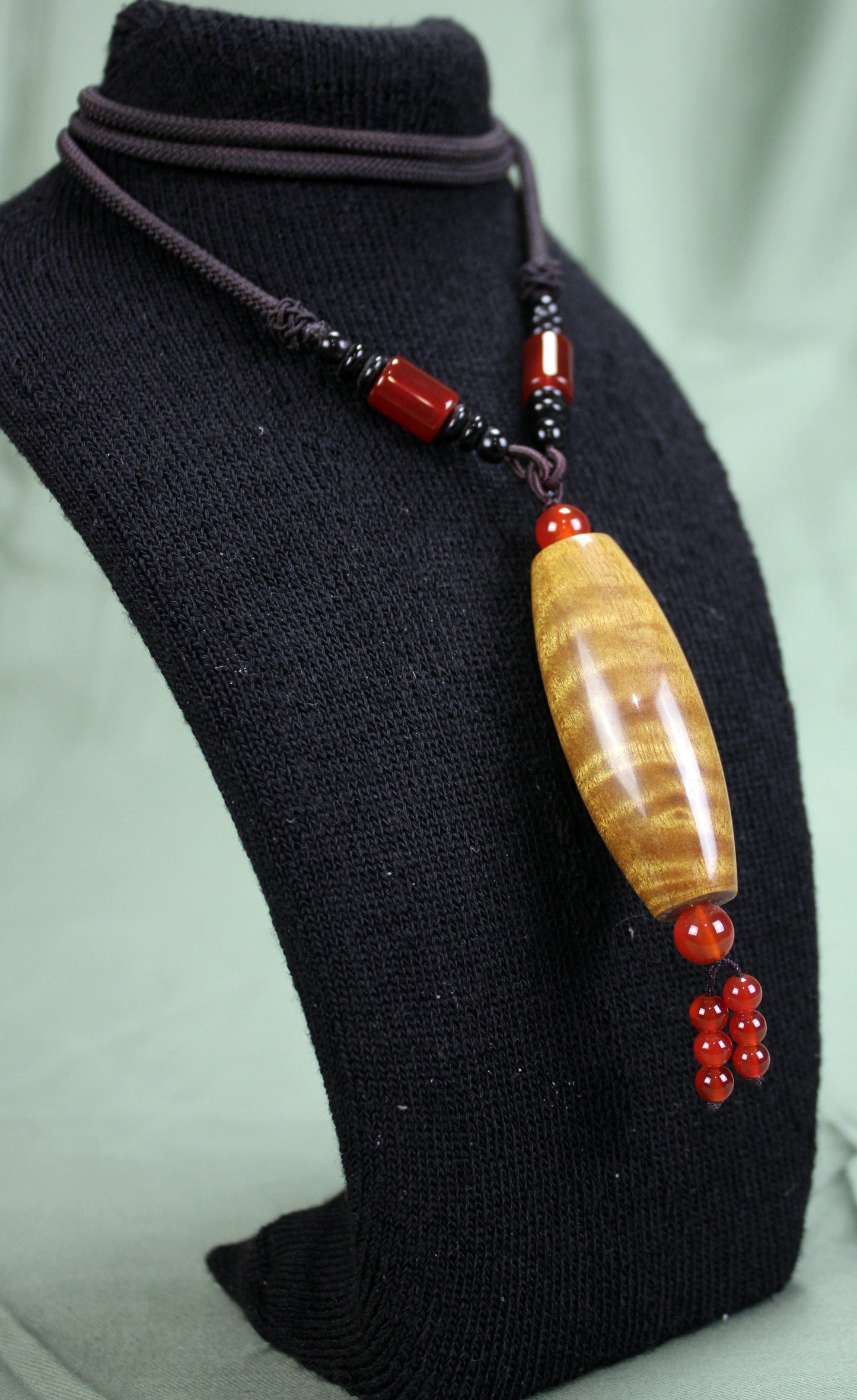 Golden Phoebe Wood Dzi Pendant Necklace with Red Agate Accents