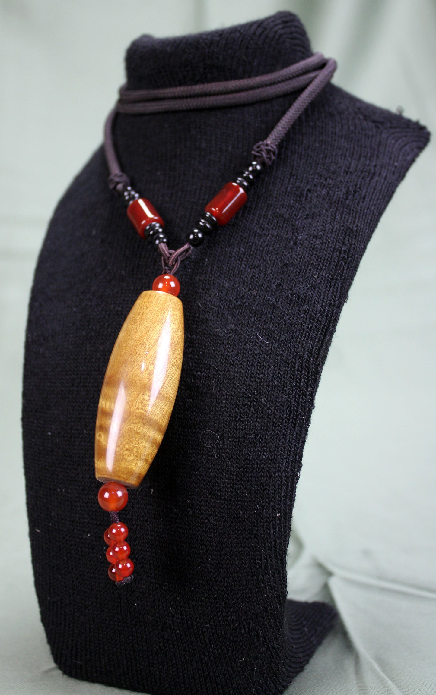Golden Phoebe Wood Dzi Pendant Necklace with Red Agate Accents