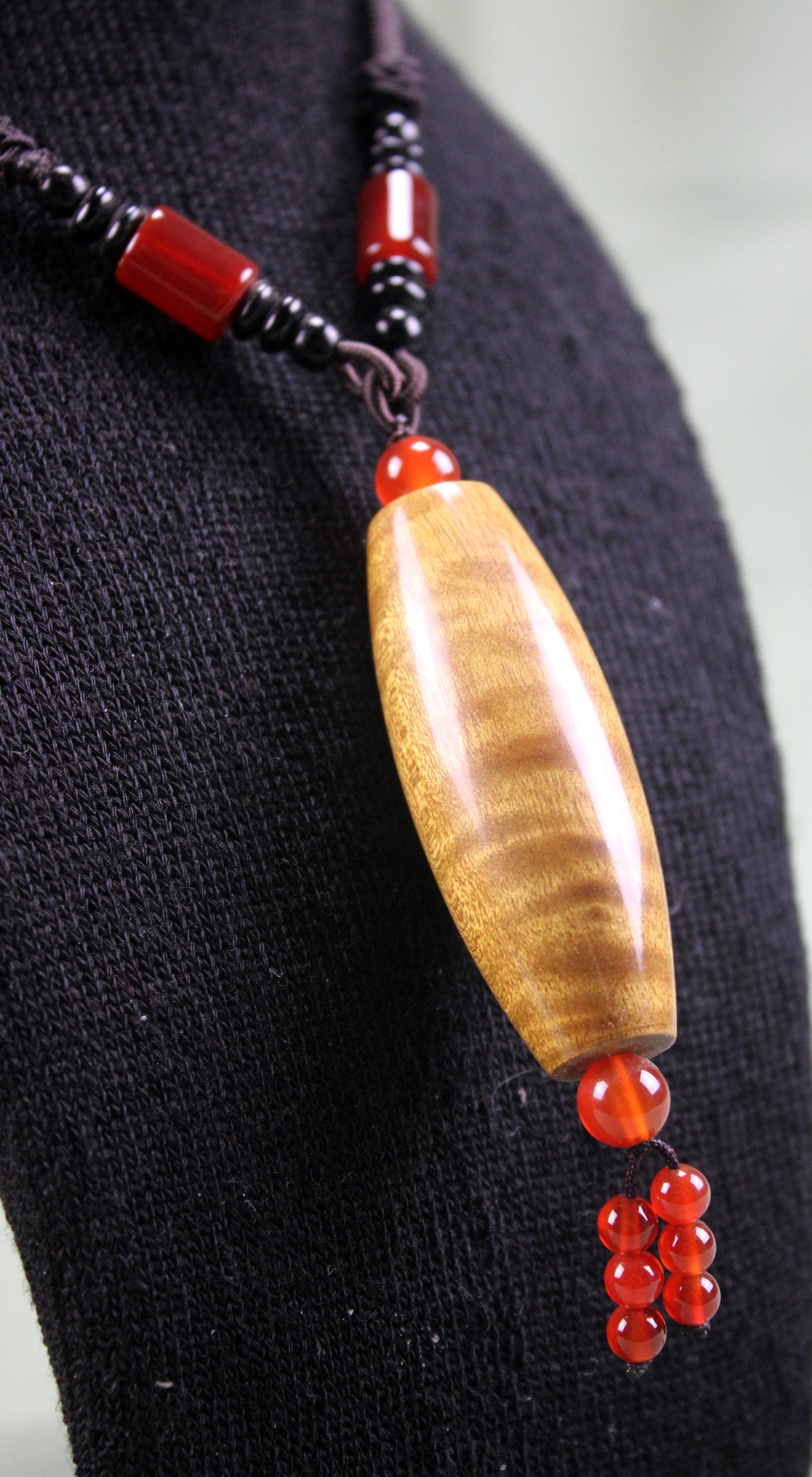 Golden Phoebe Wood Dzi Pendant Necklace with Red Agate Accents
